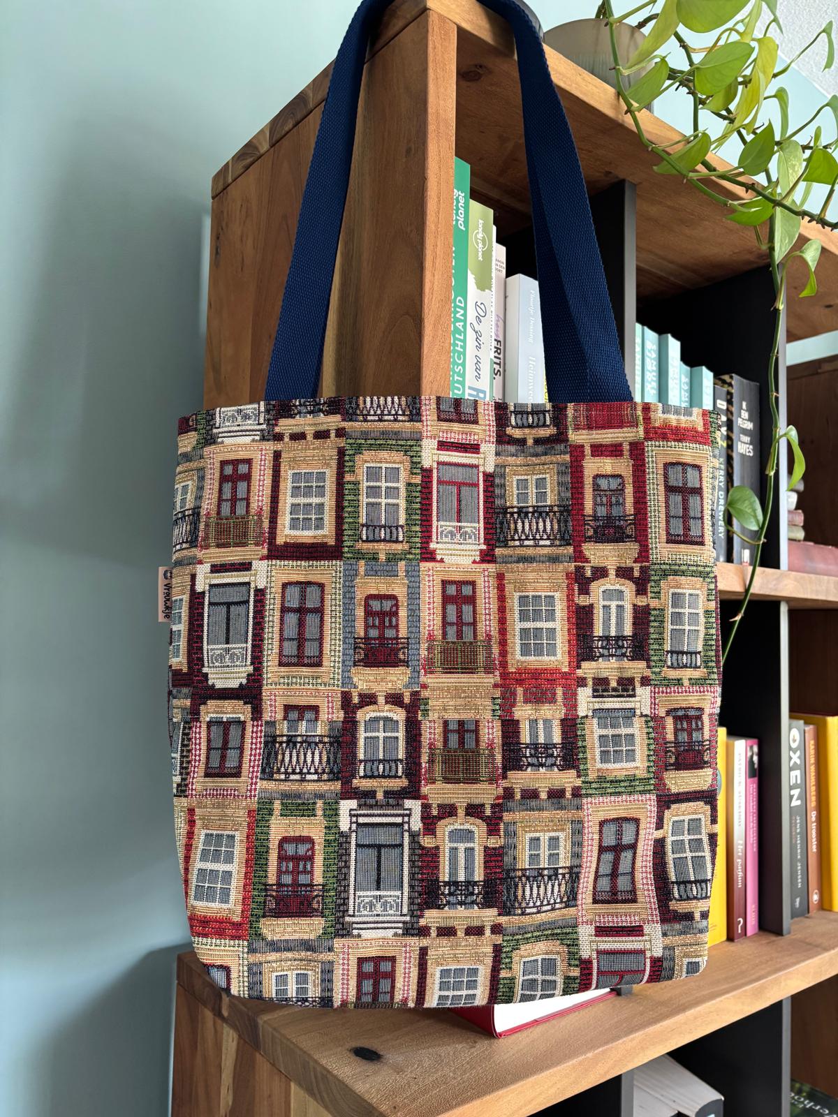 Gewatteerde booksleeve in zacht roze op cremekleurig linnen met droogbloemen